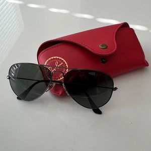 Ray-Ban Aviator Sunglasses- Gun metal frame/G-15 polarized lenses.